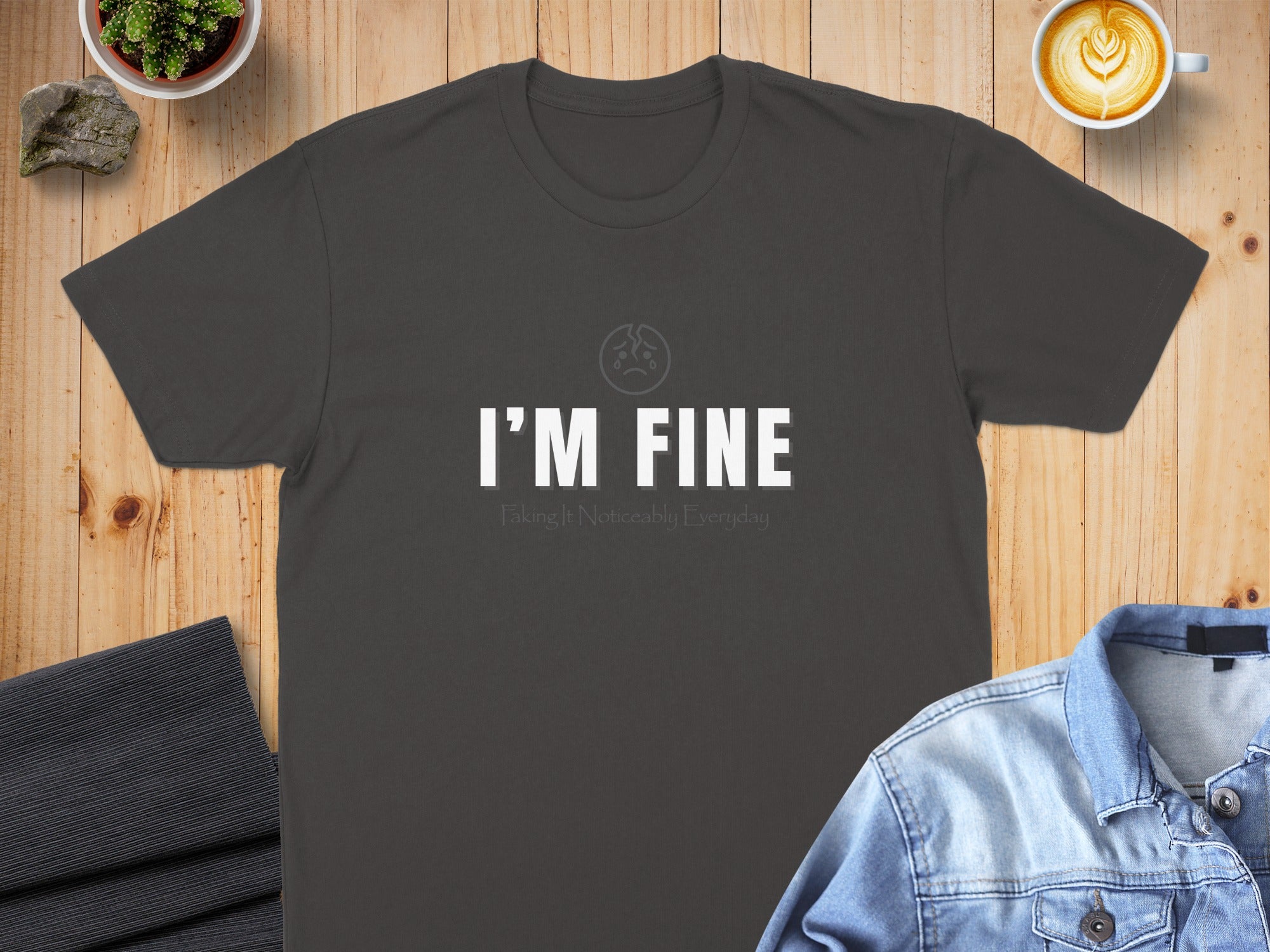 Dark gray t-shirt with "I'M FINE Faking It Noticeably Everyday" text.