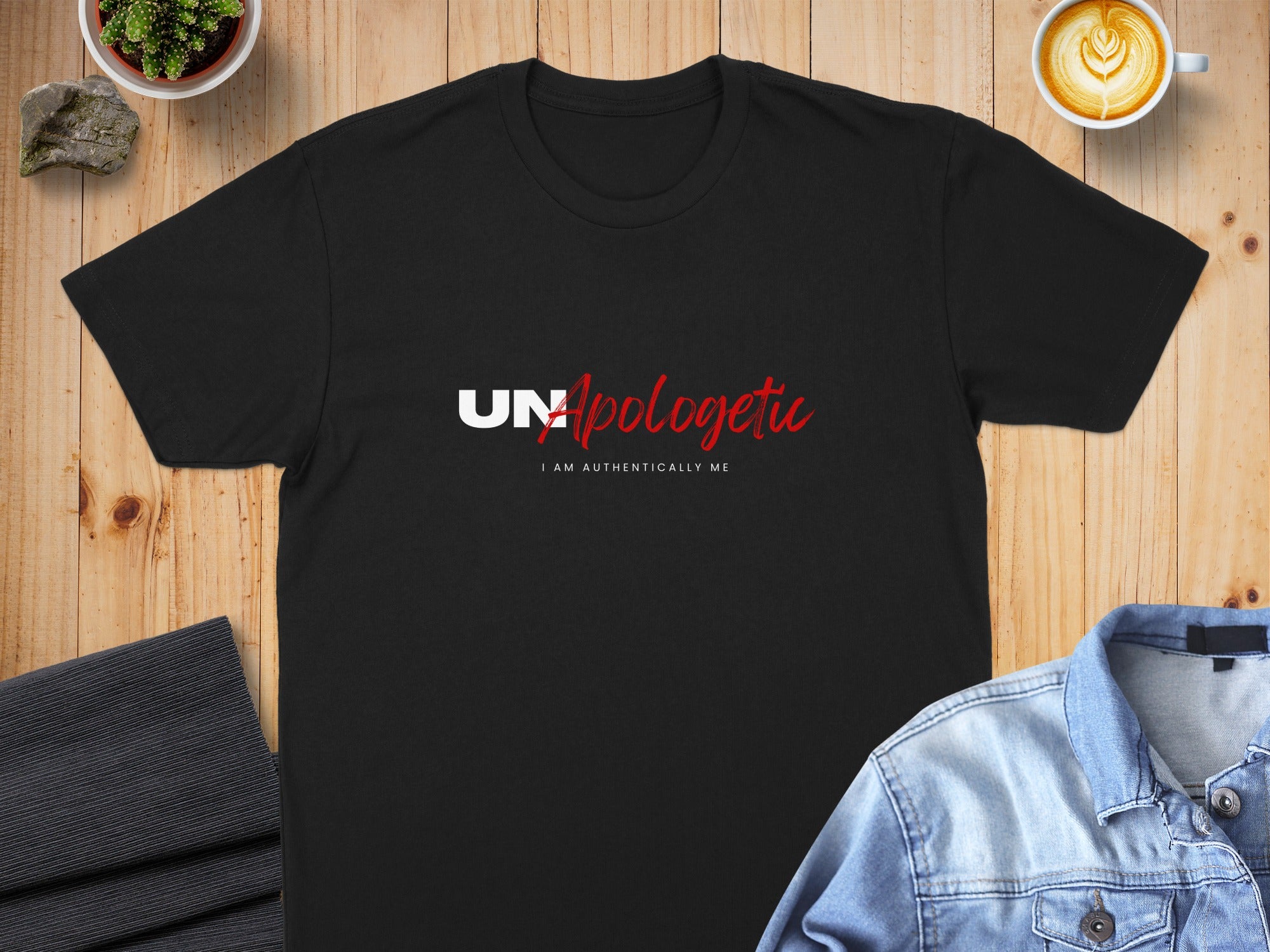 Black t-shirt with white and red "UNApologetic I AM AUTHENTICALLY ME" text.