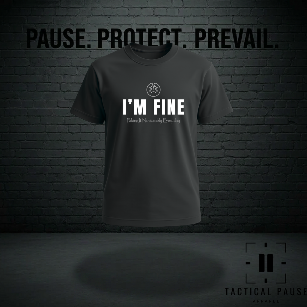 Faking It Noticeably Everyday Veterans & first responders T-shirt, against a dark gray wall with the words Pause, Protect, Prevail. Tactical Pause Apparel.