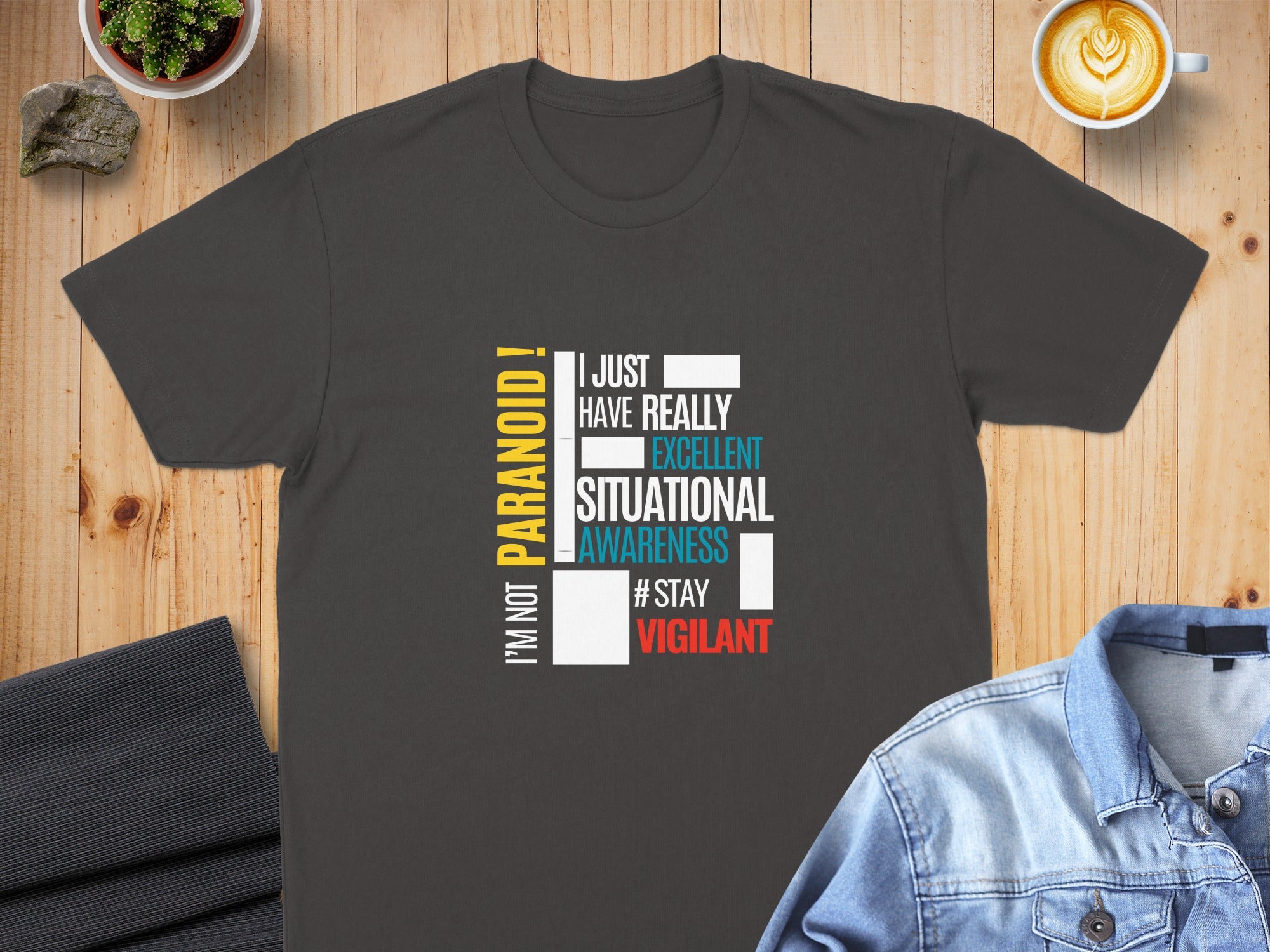 Dark grey t-shirt with "I'm not paranoid!" and "I just have really excellent situational awareness #stayvigilant".