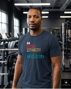 Veteran in Navy Quit Quitting on Yourself Resiliency tee standing in the gym around equipment — Tactical Pause Apparel