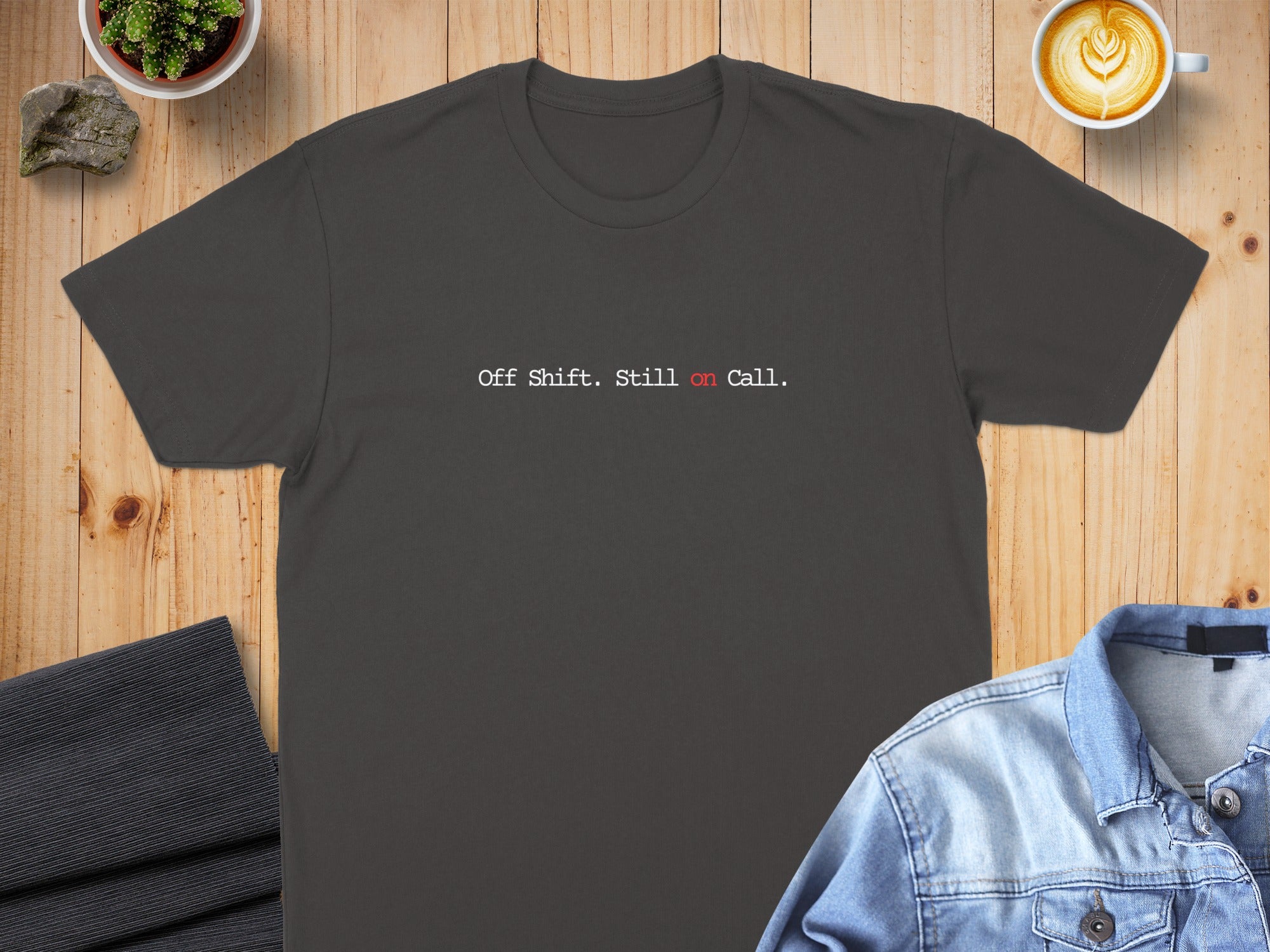 Dark gray t-shirt with white text "Off Shift. Still on call."