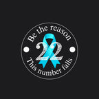 A circular graphic design on a dark background featuring a turquoise awareness ribbon and the number 22, with the text 'Be the reason 22 This number falls'. Tactical Pause Apparel